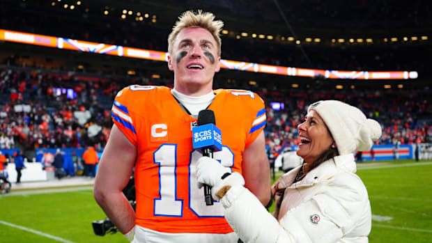 CBS Sports reporter Tracy Wolfson interviews Denver Broncos quarterback Bo Nix (10) following the win against the Kansas City