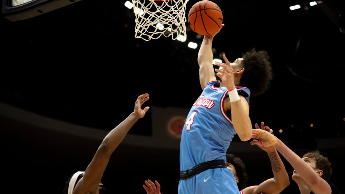 Dayton Flyers guard Koby Brea (4) grabs a rebound in the first half of the NCAA men's basketball