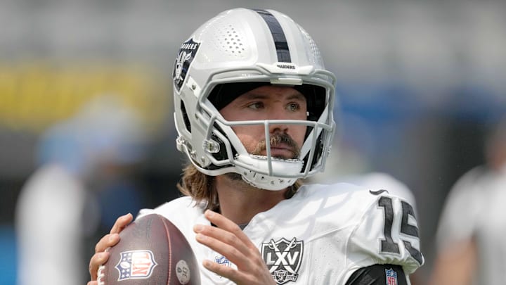 Sep 8, 2024; Inglewood, California, USA; Las Vegas Raiders quarterback Gardner Minshew (15) throws the ball against the Los Angeles Chargers at SoFi Stadium. Mandatory Credit: Kirby Lee-Imagn Images