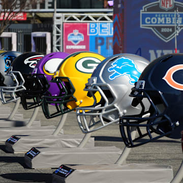 Feb 28, 2024; Indianapolis, IN, USA; A general view of large Chicago Bears, Detroit Lions and Green Bay Packers helmets at the NFL Scouting Combine Experience at Lucas Oil Stadium. Mandatory Credit: Kirby Lee-Imagn Images