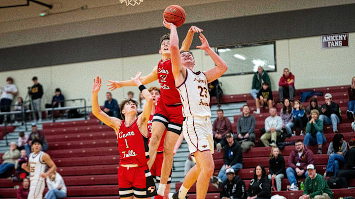 Ankeny's Drew Sorensen (23) and Cedar Falls' William Gerdes (32) battle earlier this year.