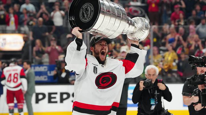 Jun 14, 2026; Las Vegas, Nevada, USA; Carolina Hurricanes goaltender Brandon Bussi (32) raises the the Stanley Cup after defeating the Vegas Golden Knights in game six of the 2026 Stanley Cup Final at T-Mobile Arena. Mandatory Credit: Stephen R. Sylvanie-Imagn Images Jun 14, 2026; Las Vegas, Nevada, USA; Carolina Hurricanes goaltender Brandon Bussi (32) raises the the Stanley Cup after defeating the Vegas Golden Knights in game six of the 2026 Stanley Cup Final at T-Mobile Arena. Mandatory Credit: Stephen R. Sylvanie-Imagn Images
