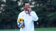 Aug 1, 2021; Tokyo, Japan; Xander Schauffele (USA) celebrates on the podium after winning the gold medal during the final round of the men's individual stroke play of the Tokyo 2020 Olympic Summer Games at Kasumigaseki Country Club. Mandatory Credit: Kyle Terada-USA TODAY Sports