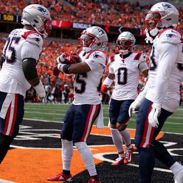 New England Patriots corner back Marcus Jones (25) celebrates with his team in the second quarter of the NFL game against the New England Patriots at Paycor Stadium in Cincinnati on Sunday, Sept. 8, 2024.