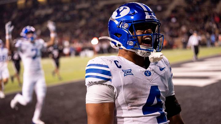 BYU Cougars running back LJ Martin (4) reacts after scoring a touchdown in the fourth quarter of the NCAA football game between the Cincinnati Bearcats and BYU Cougars at Nippert Stadium in Cincinnati on Nov. 22, 2025.