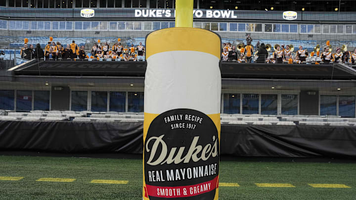 Jan 3, 2025; Charlotte, NC, USA;  Signage for the Dukes Mayo Bowl between the Minnesota Golden Gophers and the Virginia Tech Hokies at Bank of America Stadium. Mandatory Credit: Jim Dedmon-Imagn Images