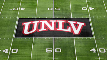 The UNLV Rebels logo at midfield during the Mountain West Championship at Allegiant Stadium. Mandatory Credit: Kirby Lee-Imagn Images
