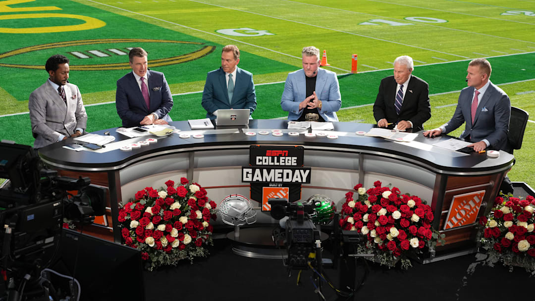 Jan 1, 2025; Pasadena, California, USA; From left: Desmond Howard, Rece Davis, Nick Saban, Pat McAfee, Lee Corso and Kirk Herbstreit on the ESPN Gameday set at Rose Bowl Stadium. Mandatory Credit: Kirby Lee-Imagn Images