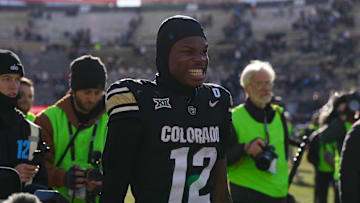 Nov 29, 2024; Boulder, Colorado, USA; Colorado Buffaloes wide receiver Travis Hunter (12) reacts following the win against the Oklahoma State Cowboys at Folsom Field. 