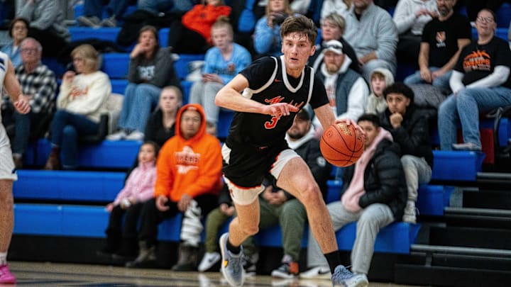 Madrid's Toryn Severson (3) drives to the basket on Monday, Jan. 6, 2025, at Ankeny Christian Academy.