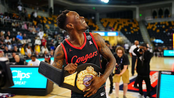 Mar 31, 2022; New Orleans, LA, USA; Houston Cougars Guard Taze Moore (4) celebrates after winning at Convocation Center. Mandatory Credit: Andrew Wevers-Imagn Images