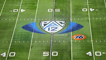 The Pac-12 Conference logo at midfield at Allegiant Stadium. Mandatory Credit: Kirby Lee-Imagn Images