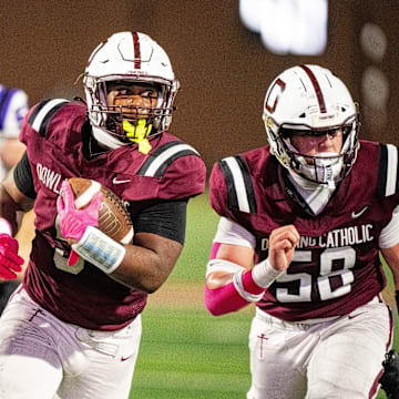 Dowling Catholic’s Ian Middleton (5) takes the ball up the field against Waukee on Oct. 10, 2025, at Valley Stadium in West Des Moines.