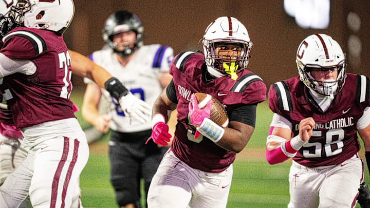 Dowling Catholic’s Ian Middleton (5) takes the ball up the field against Waukee on Oct. 10, 2025, at Valley Stadium in West Des Moines. Dowling Catholic’s Ian Middleton (5) takes the ball up the field against Waukee on Oct. 10, 2025, at Valley Stadium in West Des Moines.