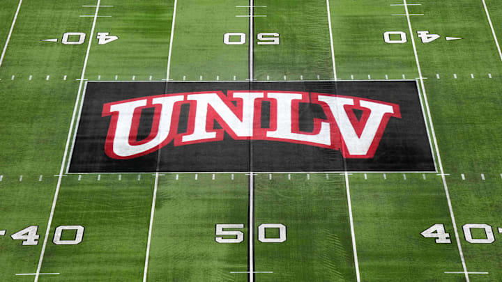 The UNLV Rebels logo at midfield during the Mountain West Championship at Allegiant Stadium. Mandatory Credit: Kirby Lee-Imagn Images