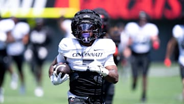 Cincinnati Bearcats running back Chance Williams (7) runs downfield during the Cincinnati Bearcats football spring practice at Nippert Stadium on Saturday, April 12, 2025.