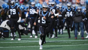 Jan 7, 2024; Charlotte, North Carolina, USA;Carolina Panthers quarterback Bryce Young (9) leads his team onto the field during the first quarter against the Tampa Bay Buccaneers at Bank of America Stadium. Mandatory Credit: Jim Dedmon-USA TODAY Sports