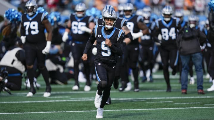 Jan 7, 2024; Charlotte, North Carolina, USA;Carolina Panthers quarterback Bryce Young (9) leads his team onto the field during the first quarter against the Tampa Bay Buccaneers at Bank of America Stadium. Mandatory Credit: Jim Dedmon-USA TODAY Sports