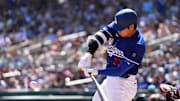 Ohtani swings during Dodgers spring training.