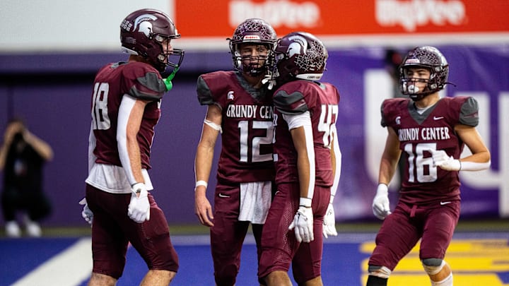 Grundy Center celebrates a touchdown against Dike-New Hartford on Thursday, Nov. 21, 2024, at the UNI-Dome in Cedar Falls, IA.