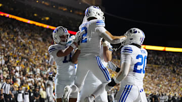 Sep 27, 2025; Boulder, Colorado, USA; Brigham Young Cougars wide receiver Chase Roberts (2) celebrates his touchdown reception in the third quarter against the Colorado Buffaloes at Folsom Field. Mandatory Credit: Ron Chenoy-Imagn Images