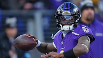 Jan 4, 2025; Baltimore, Maryland, USA; Baltimore Ravens quarterback Lamar Jackson (8) makes a pass during the first quarter against the Cleveland Browns at M&T Bank Stadium. Mandatory Credit: Mitch Stringer-Imagn Images