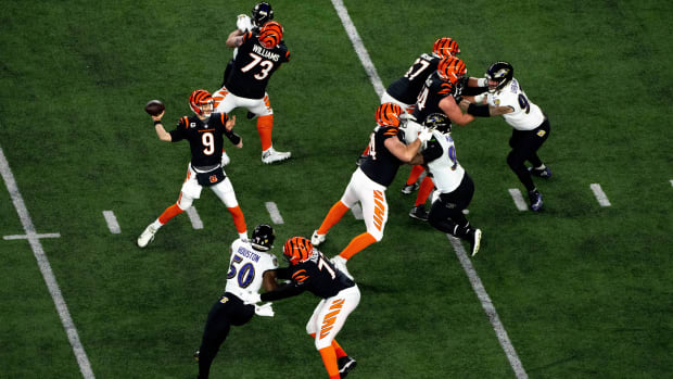 Cincinnati Bengals quarterback Joe Burrow (9) throws a pass against the Baltimore Ravens  