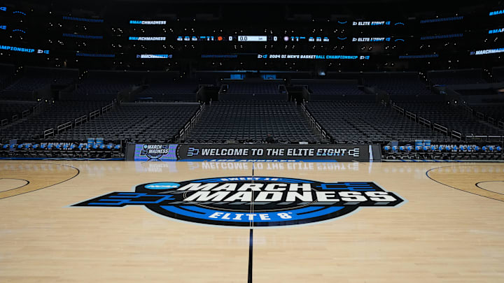 Mar 30, 2024; Los Angeles, CA, USA; The NCAA March Madness Sweet 16 and Elite Eight logo at midcourt before the game between the Clemson Tigers and the Alabama Crimson Tide in the finals of the West Regional of the 2024 NCAA Tournament at Crypto.com Arena.