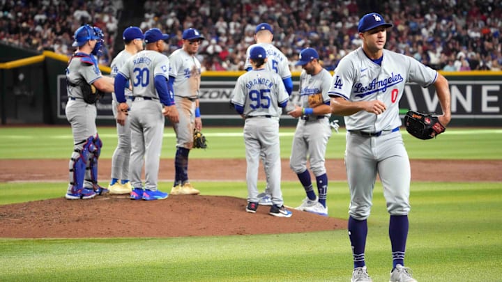 Sep 2, 2024; Phoenix, Arizona, USA; Los Angeles Dodgers pitcher Jack Flaherty (0) leaves the game against the Arizona Diamondbacks during the sixth inning at Chase Field. Mandatory Credit: Joe Camporeale-Imagn Images