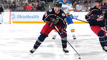 Blue Jackets center Adam Fantilli looks to make a play with the puck. 