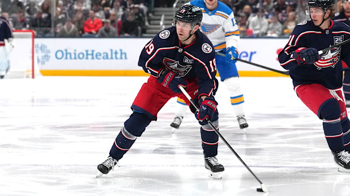 Blue Jackets center Adam Fantilli looks to make a play with the puck. 