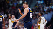 Nov 8, 2025; Denver, Colorado, USA; Denver Nuggets center Nikola Jokic (15) calls out in the second quarter against the Indiana Pacers at Ball Arena. Mandatory Credit: Ron Chenoy-Imagn Images