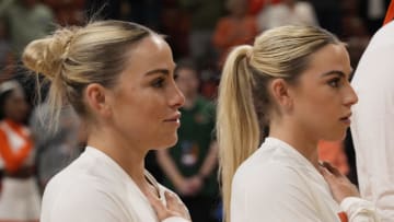 Mar 26, 2023; Greenville, SC, USA; Miami Hurricanes guard Haley Cavinder (14) and guard Hanna Cavinder (15).