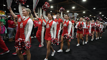 The Ohio State Buckeyes cheerleaders at the College Football Playoff Fan Central at the Georgia World Congress Center. 