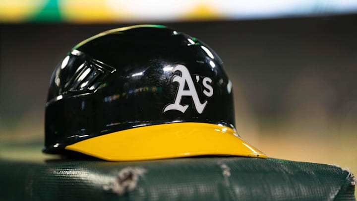 Jul 23, 2024; Oakland, California, USA;  General view of an Oakland Athletics helmet after defeating the Houston Astros at Oakland-Alameda County Coliseum. Mandatory Credit: Stan Szeto-Imagn Images