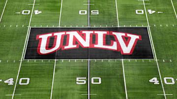 The UNLV Rebels logo at midfield during the Mountain West Championship at Allegiant Stadium. Mandatory Credit: Kirby Lee-Imagn Images