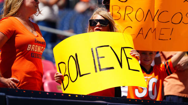 Aug 25, 2024; Denver, Colorado, USA; Denver Broncos fan holds a sign in reference to quarterback Bo Nix (10) 