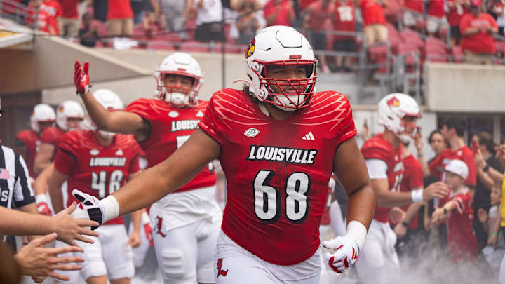 Louisville Cardinals take the field ahead of their game against the Austin Peay Governors on Saturday, Aug. 31, 2024 at L&N Federal Credit Union Stadium in Louisville, Ky.