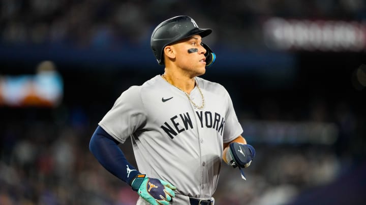 New York Yankees outfielder Aaron Judge (99) runs to first base against the Toronto Blue Jays at Rogers Centre.