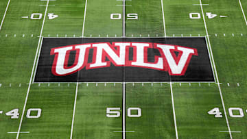 The UNLV Rebels logo at midfield during the Mountain West Championship at Allegiant Stadium. Mandatory Credit: Kirby Lee-Imagn Images