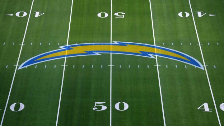 Sep 25, 2022; Inglewood, California, USA; The Los Angeles Chargers bolt logo at midfield at SoFi Stadium. Mandatory Credit: Kirby Lee-USA TODAY Sports