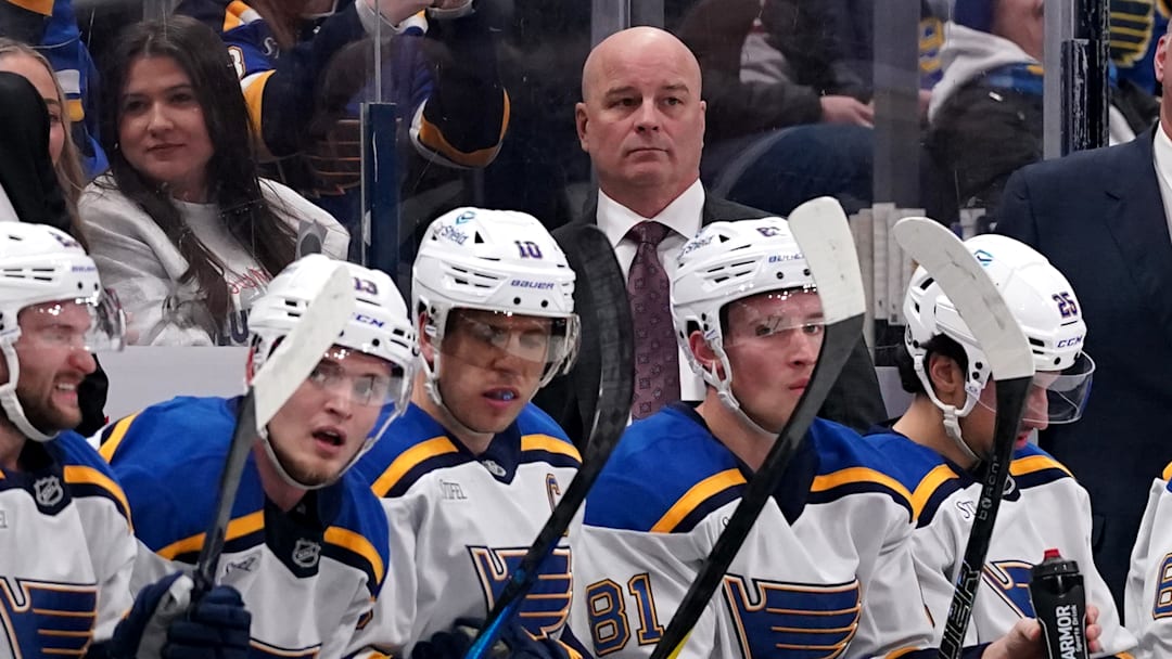 Newly acquired and future long-term head coach Jim Montgomery behind the bench