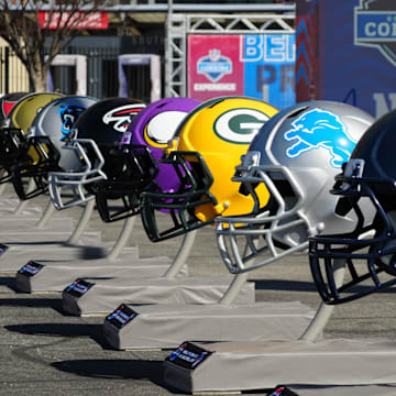 Feb 28, 2024; Indianapolis, IN, USA; A general view of large Chicago Bears, Detroit Lions and Green Bay Packers helmets at the NFL Scouting Combine Experience at Lucas Oil Stadium. Mandatory Credit: Kirby Lee-Imagn Images