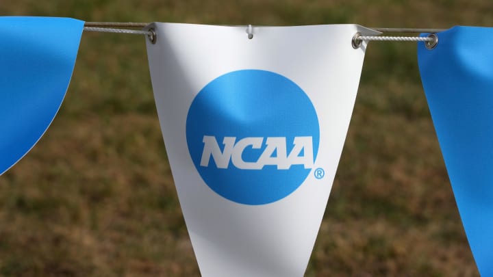 The NCAA logo on a banner at the 2023 cross country championships course at Panorama Farms. 