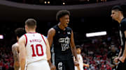 Cincinnati Bearcats forward Baba Miller (18) reacts to hitting a shot and drawing a foul in the second half of the NCAA Basketball game between Louisville Cardinals and Cincinnati Bearcats at Heritage Bank Center in Cincinnati on Nov. 21, 2025.