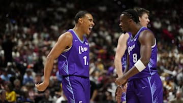 Jul 14, 2025; Las Vegas, NV, USA; Utah Jazz forward John Tonje (17) celebrates with guard Isaiah Collier (8) after scoring against the San Antonio Spurs during the second half of a NBA basketball game at the Thomas & Mack Center. Mandatory Credit: Lucas Peltier-Imagn Images