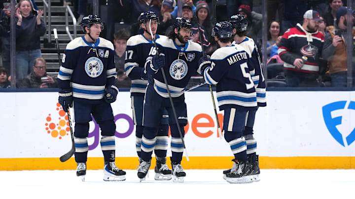 The Columbus Blue Jackets celebrate a goal against the Pittsburgh Penguins.