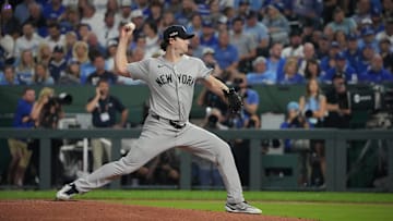 Oct 10, 2024; Kansas City, Missouri, USA; New York Yankees pitcher Gerrit Cole (45) throws a pitch during the first inning against the Kansas City Royals during game four of the ALDS for the 2024 MLB Playoffs at Kauffman Stadium. Mandatory Credit: Denny Medley-Imagn Images