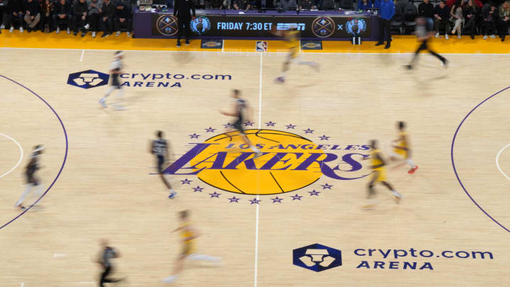 Jan 17, 2024; Los Angeles, California, USA; The Los Angeles Lakers logo at center court during the game against the Dallas Mavericks at the Crypto.com Arena. Mandatory Credit: Kirby Lee-USA TODAY Sports