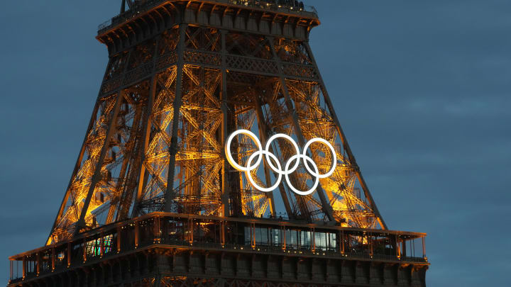 Olympic rings adorn the Eiffel Tower in advance of the 2024 Paris Olympic Games.